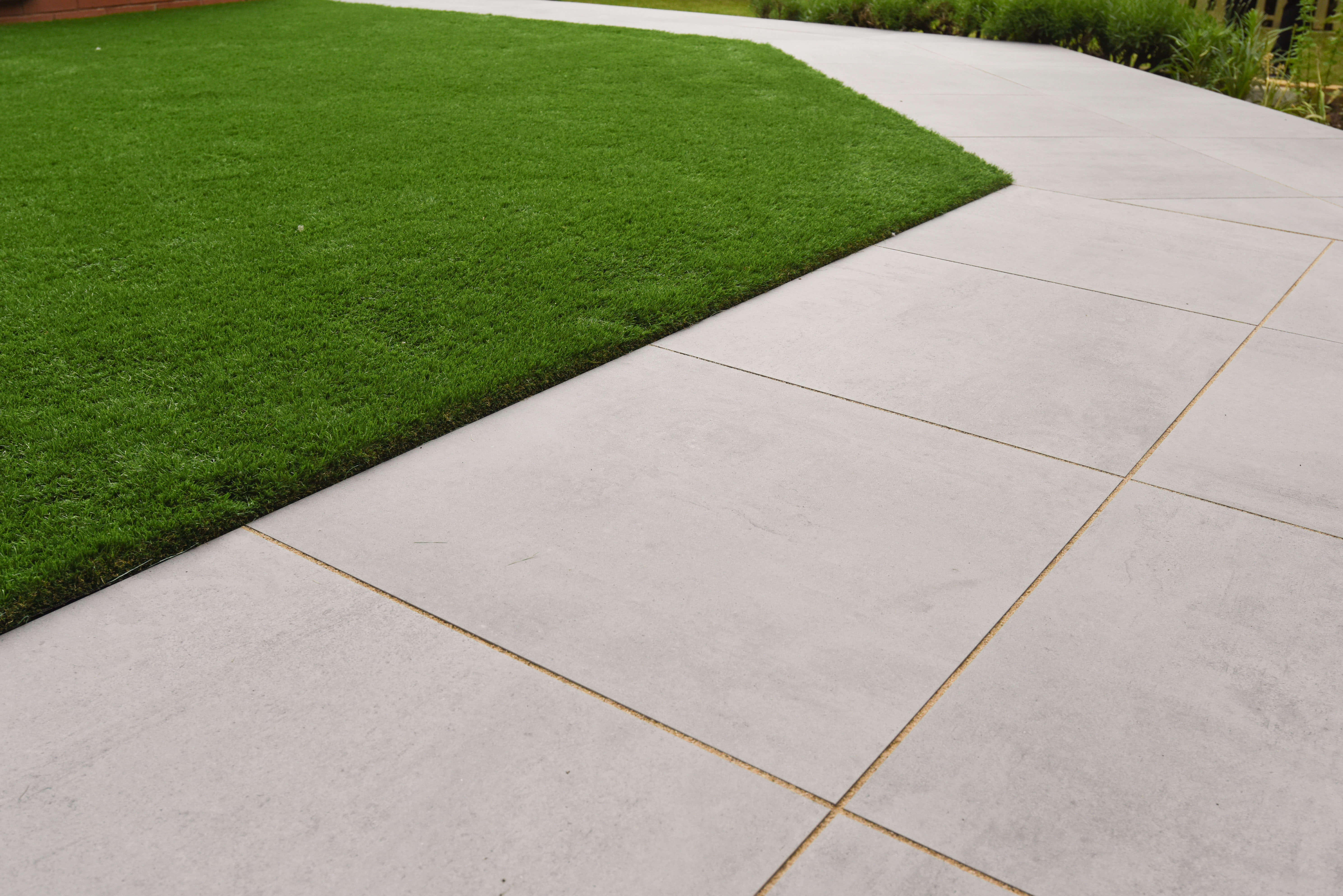Porcelain Tiles with brush in joint compound laid in the joints